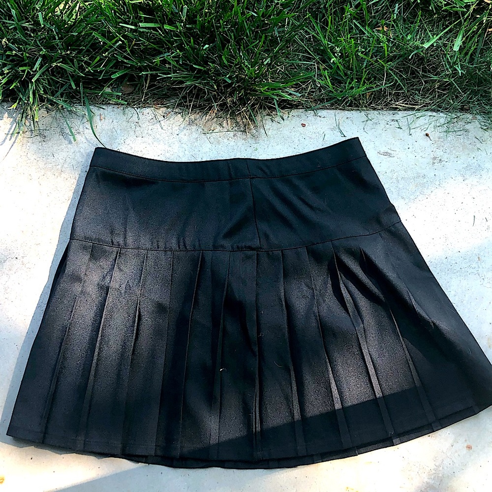 black pleated skirt